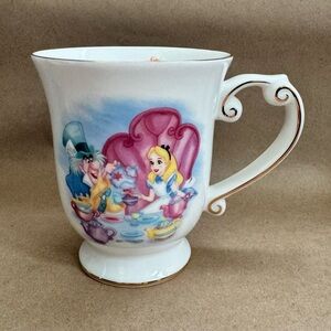 NWT Disney Parks Alice in Wonderland Mad Hatter Tea Party Footed Mug.